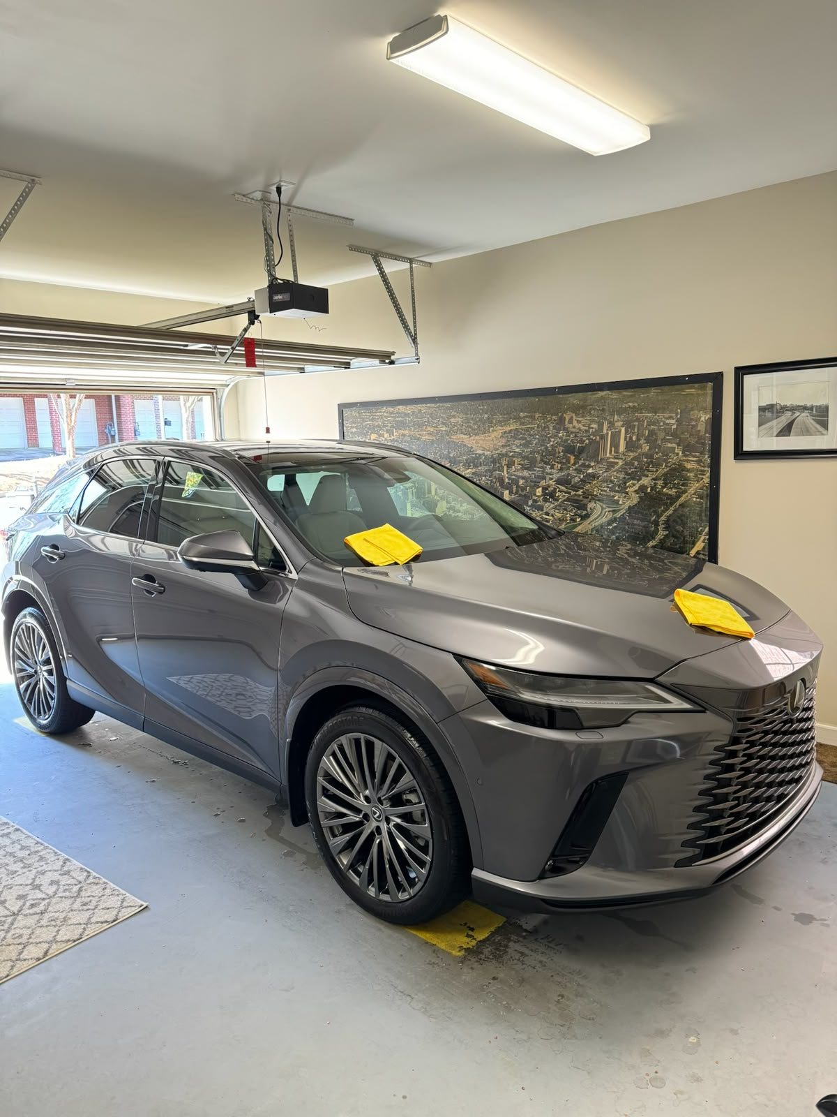 A Lexus RX finished and parked inside a home garage