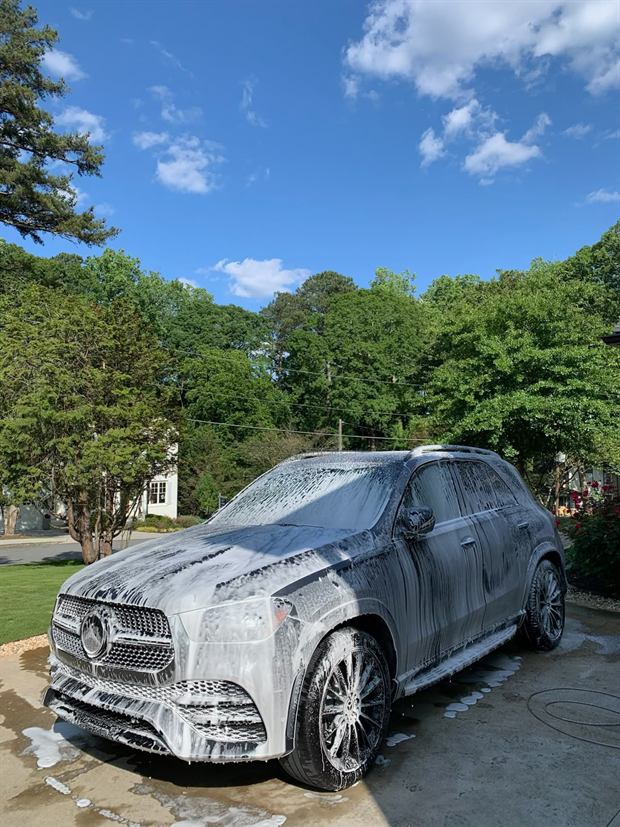 A Mercedes-Benz GLE under a full coat of foam