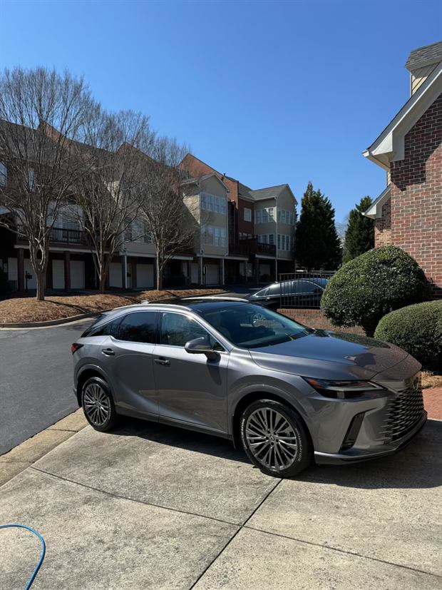 Silver Lexus RX clean and parked on a driveway
