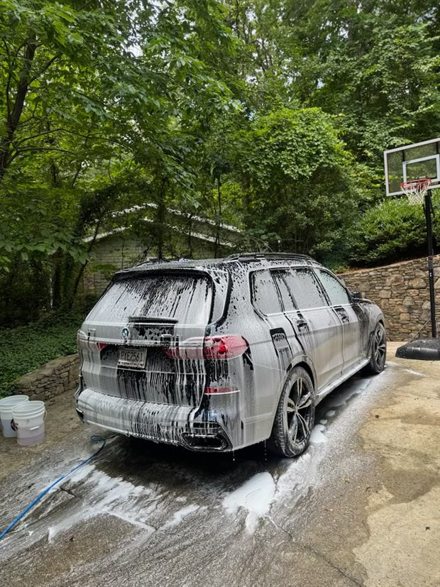Rear of a large SUV coated in thick foam
